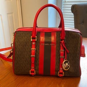 Michael Kors Bedford medium satchel with MK logo.